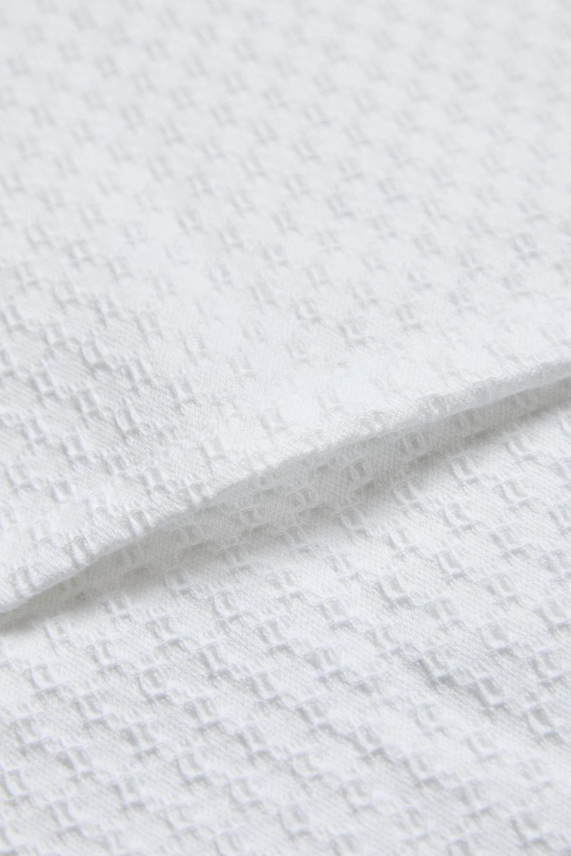 EMBOSSED THROW PILLOW COVER