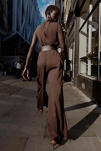 SLEEVELESS BELTED JUMPSUIT