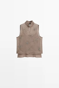 Top semi-transparent avec broderies