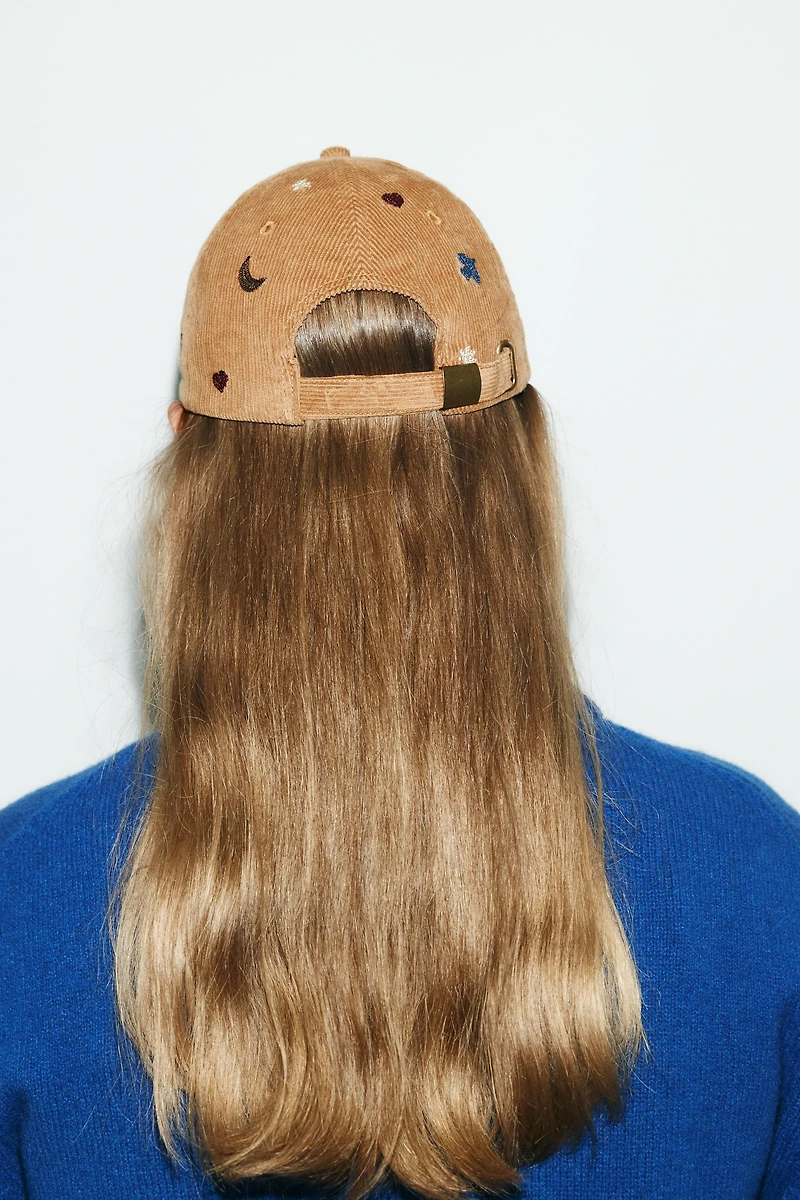CORDUROY CAP WITH BIRDS AND MOONS EMBROIDERY
