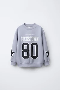 PRINTED NUMBER AND TEXT SWEATSHIRT