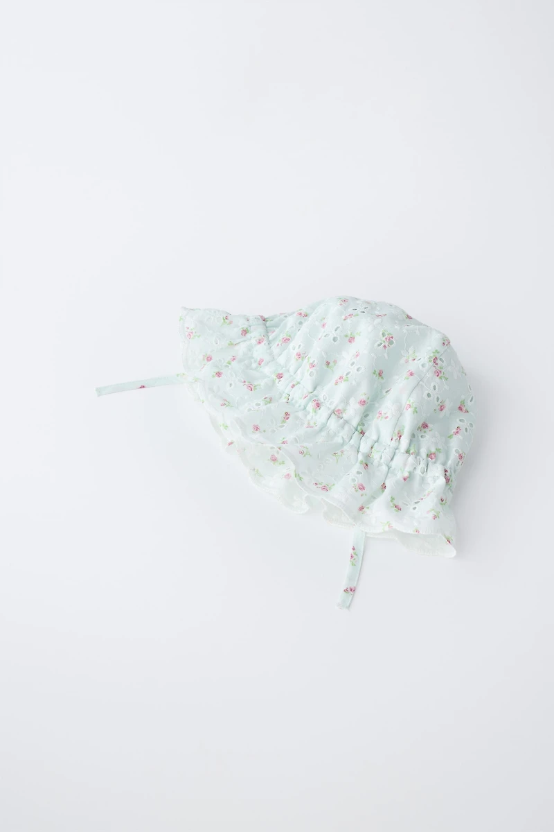 EMBROIDERED SWISS HAT WITH FLORAL PRINT
