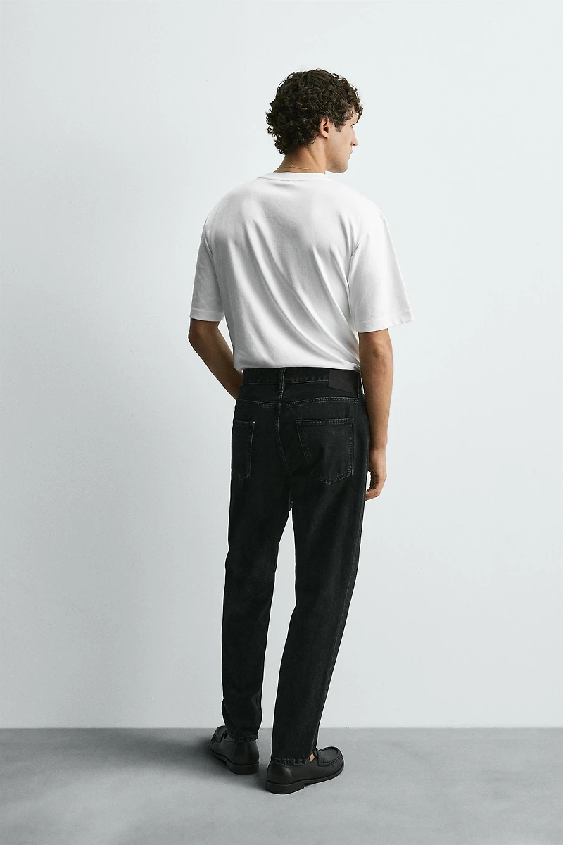 SLIM TAPERED FIT JEANS