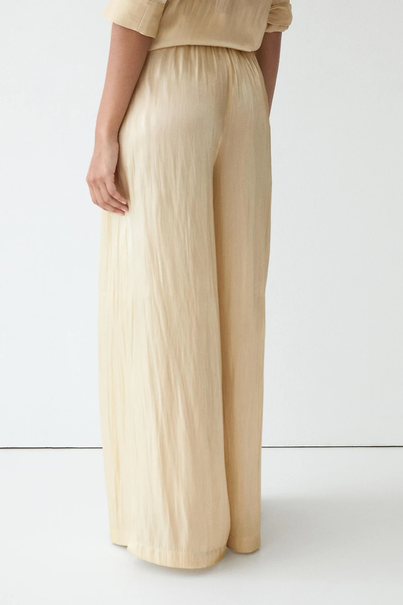Pantalon fluide en tissu satiné