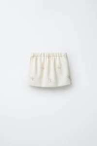 SHINY BOW TEXTURED SKIRT