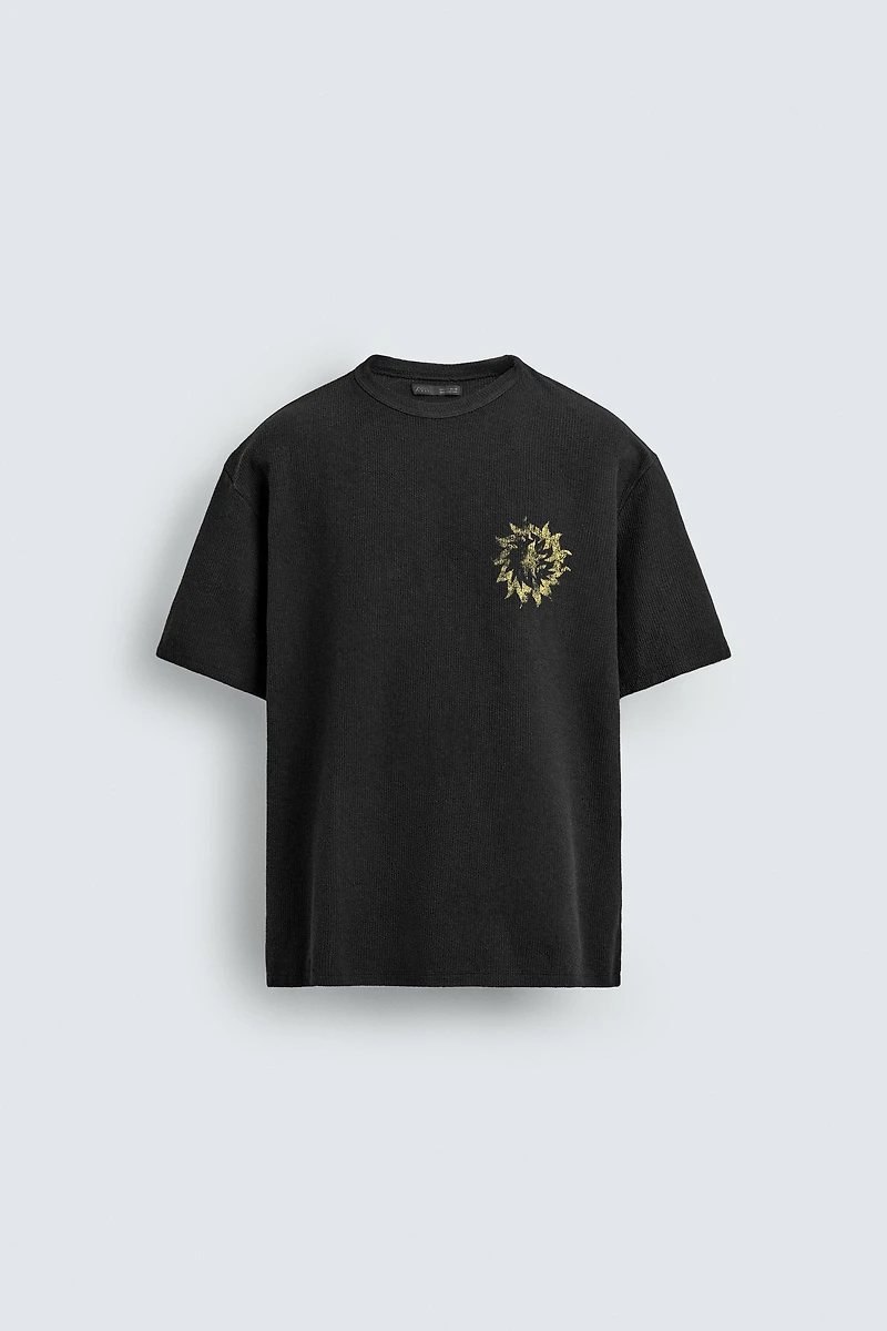 T-SHIRT EN MAILLE DÉLAVÉ IMPRIMÉS