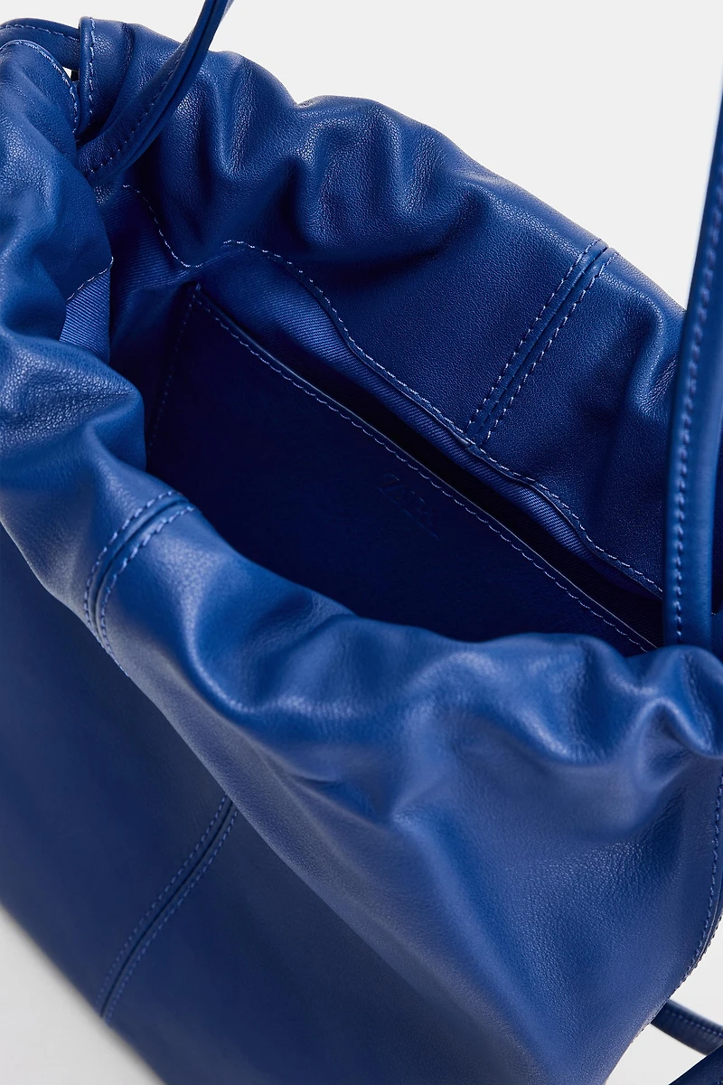 LEATHER DRAWSTRING CROSSBODY BAG