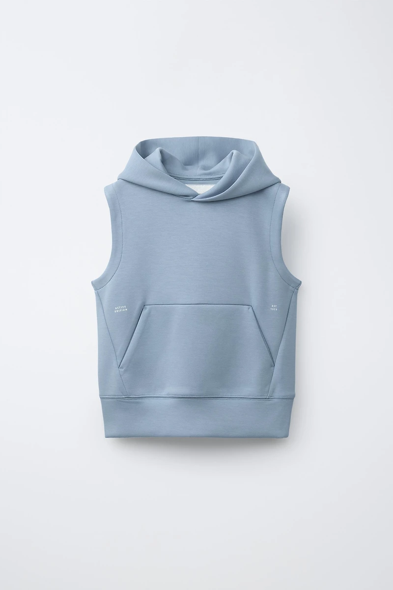 GILET À CAPUCHE SPORT