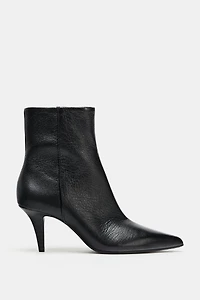 BOTTINES À TALONS EN CUIR