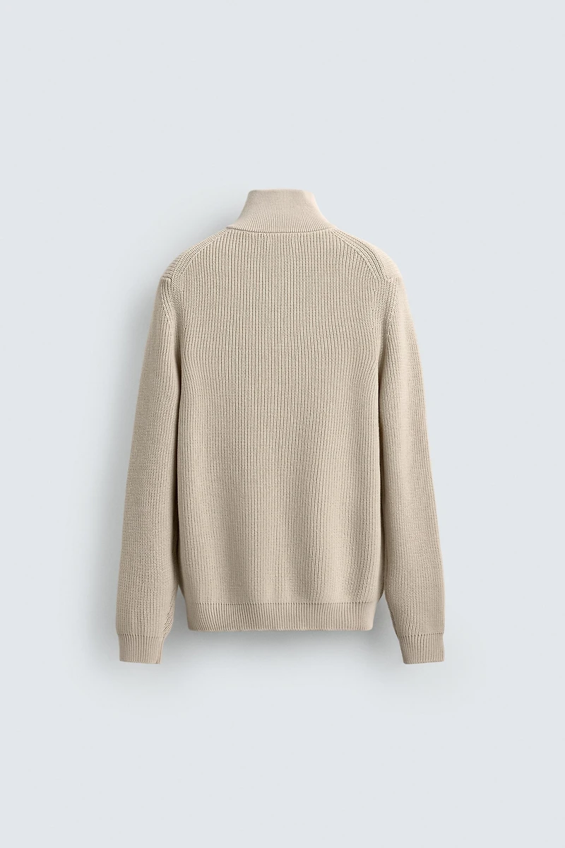 PULL EN MAILLE PERLÉE À COL ZIPPÉ