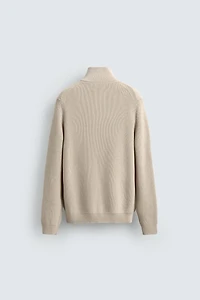 PULL EN MAILLE PERLÉE À COL ZIPPÉ