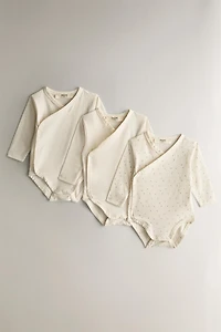SET OF PRINTED BABY BODYSUITS