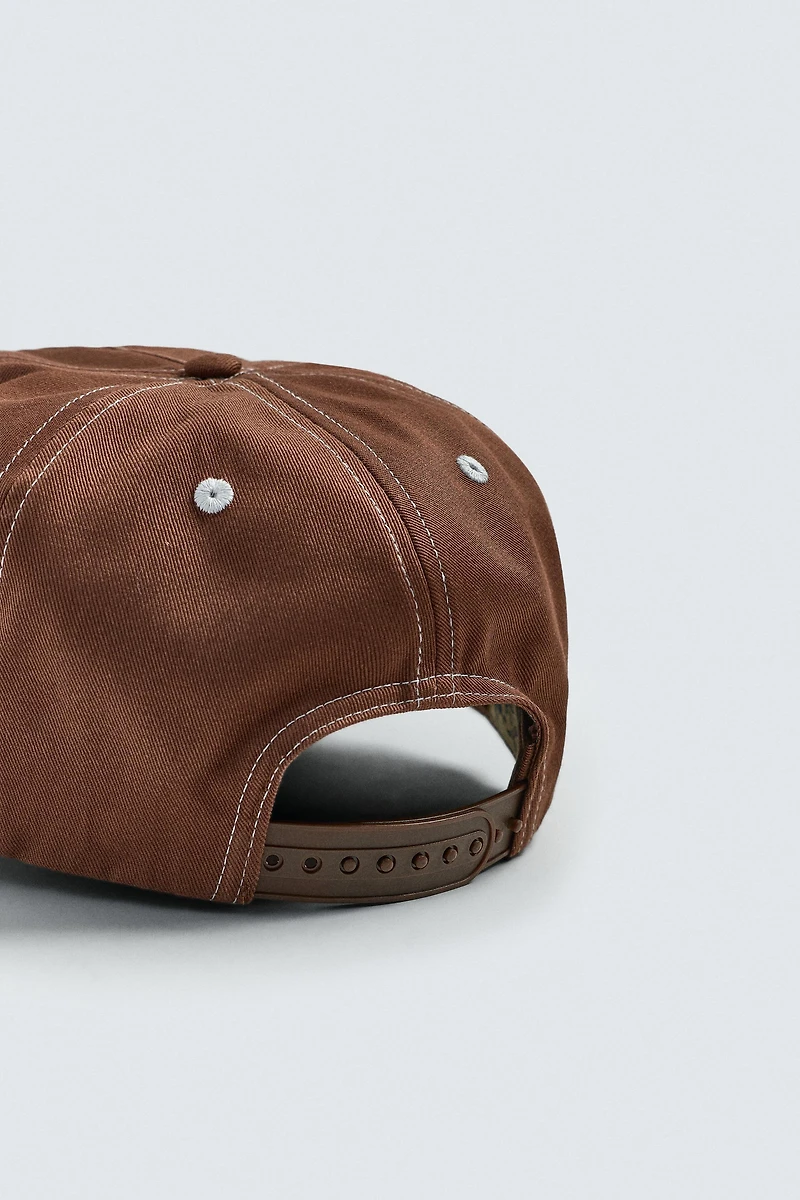 PETER PAN TEXT CAP HARRY LAMBERT FOR ZARA X DISNEY