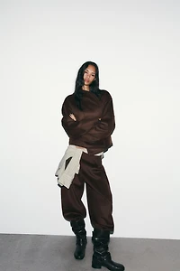 WOOL BARREL PLEATED PANTS