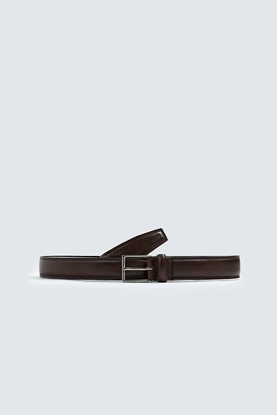 CEINTURE EN CUIR HABILLÉE