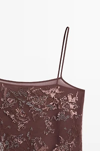 Flowing strappy top with embroidered detail