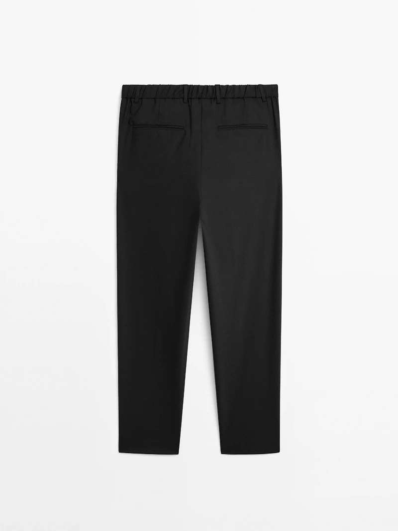 Relaxed fit trousers with darts