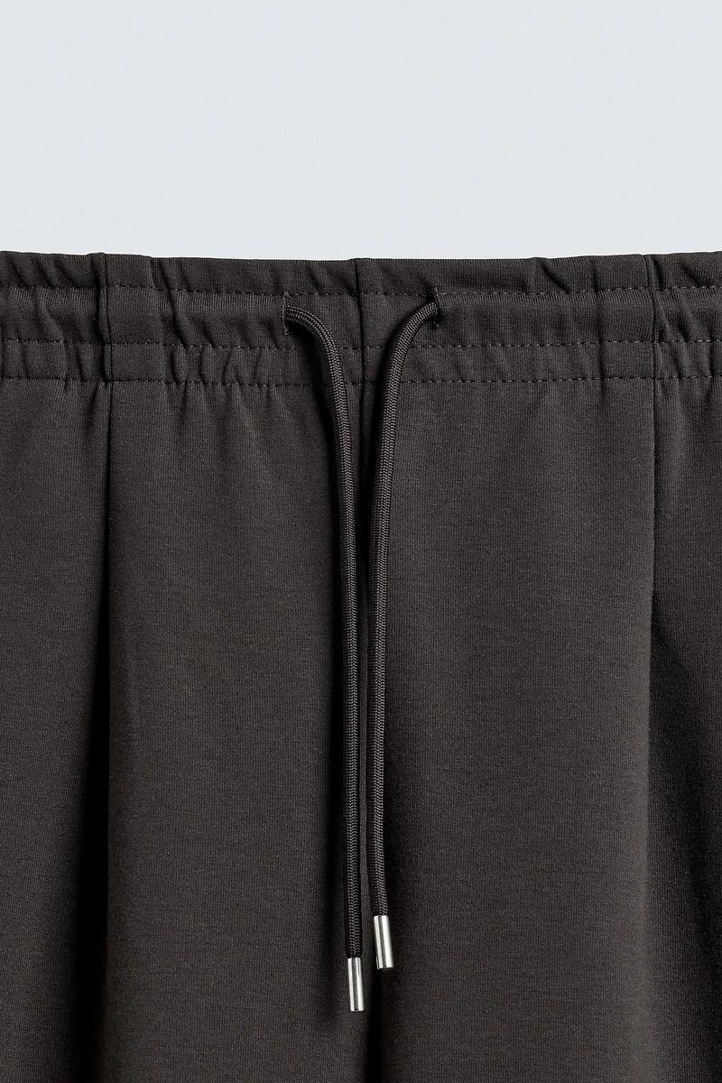 PANTALON INTERLOCK PLIS ÉTIQUETTE
