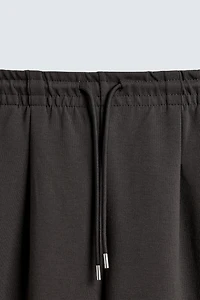 PANTALON INTERLOCK PLIS ÉTIQUETTE