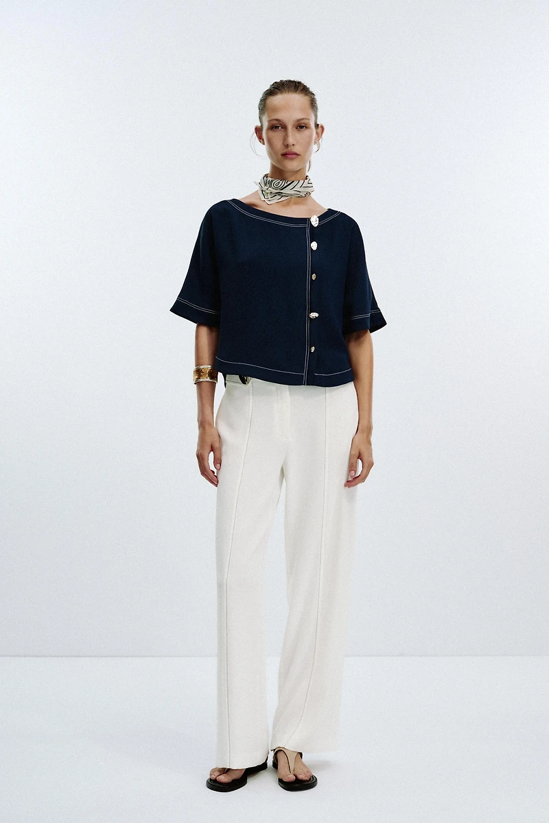 TOPSTITCHED TOP