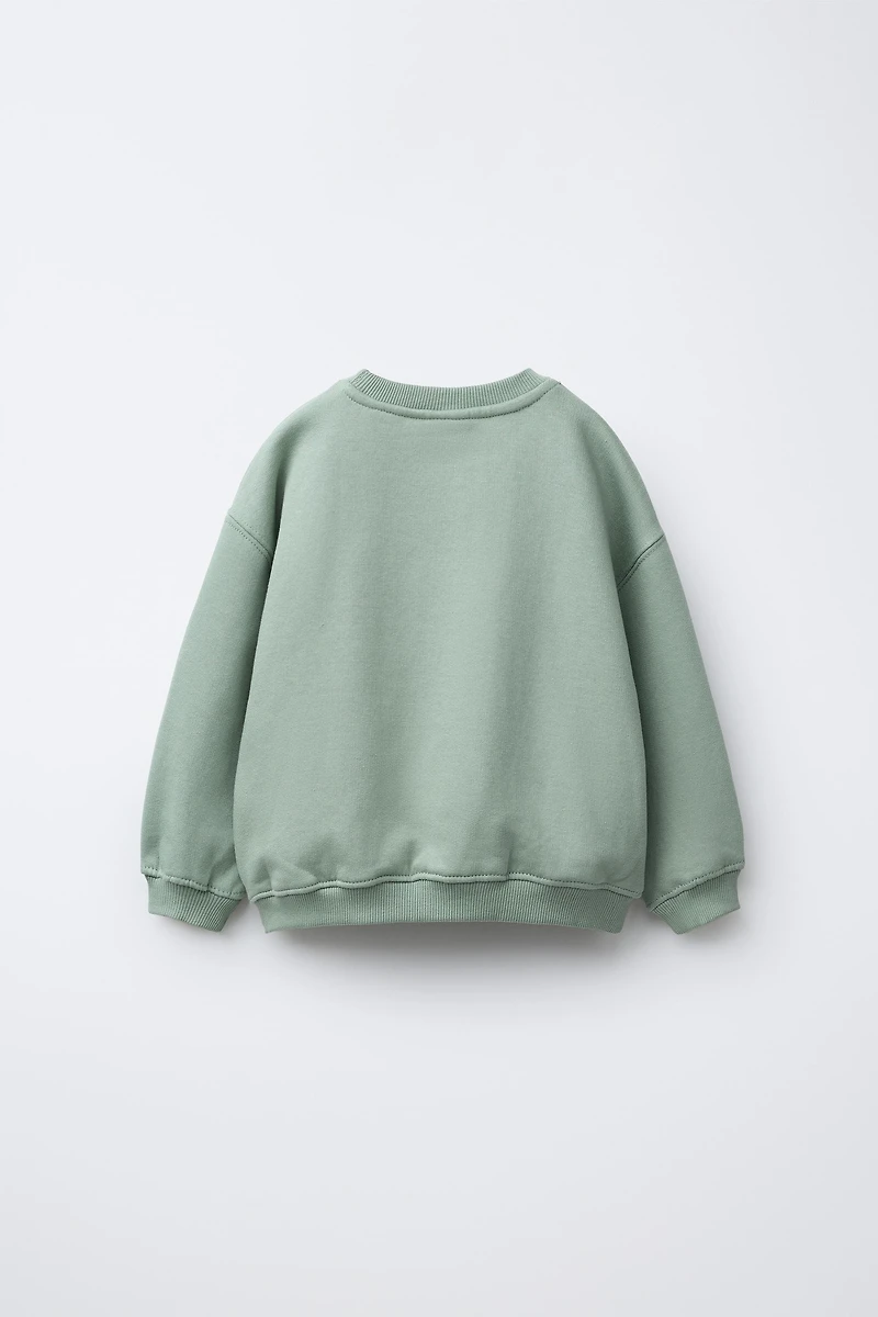VARSITY TERRY PATCH APPLIQUÉ SWEATSHIRT