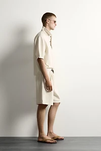BOXY FIT STRIPED POLO SHIRT