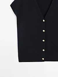 Knit vest with golden buttons