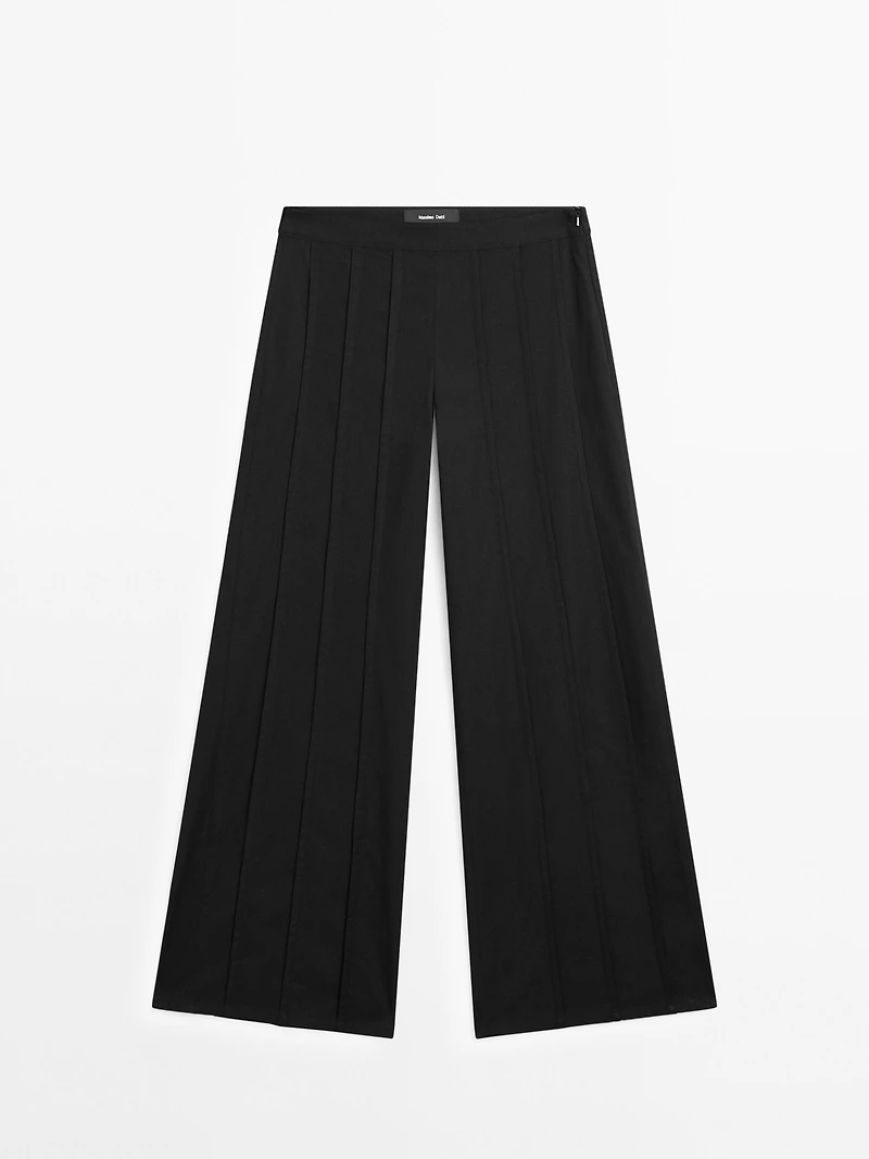 Wide-leg trousers with seam details
