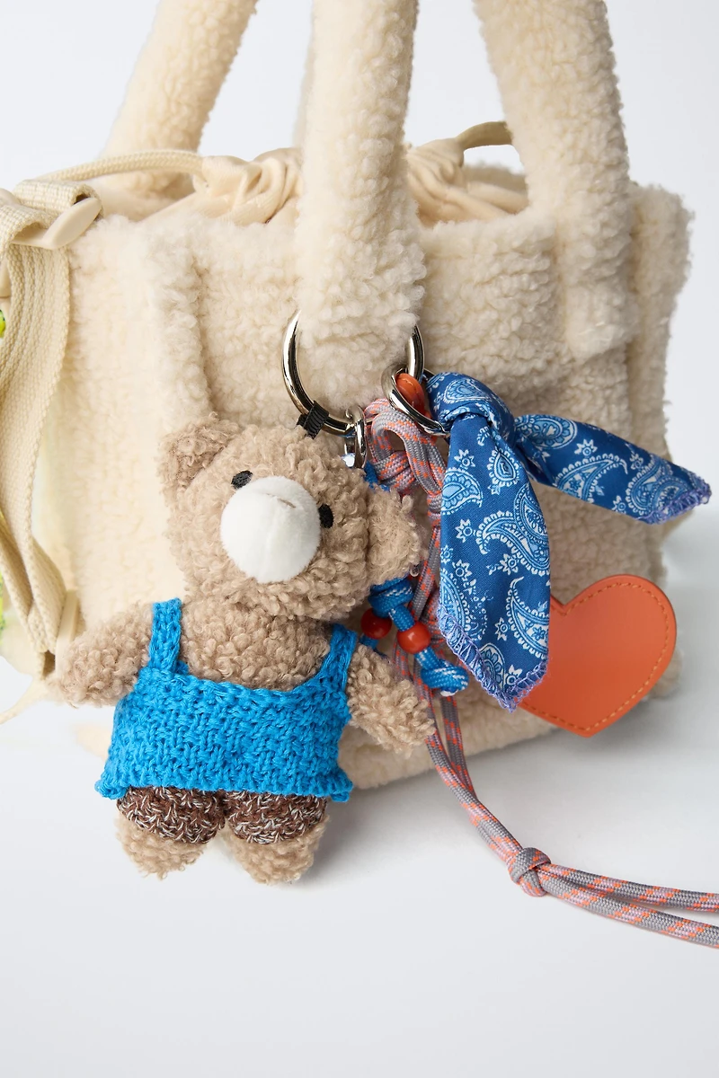 SAC BANDOULIÈRE EN PEAU DE MOUTON CHARM
