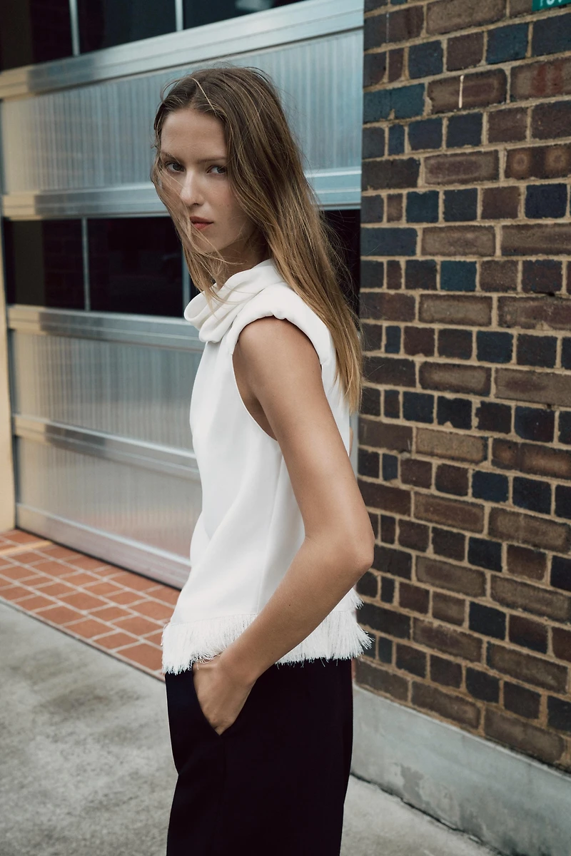 SHOULDER PAD FRINGED TOP