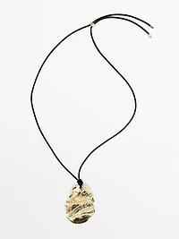Leather cord necklace with fossil pendant
