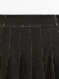 Jupe midi denim plissée effet velours