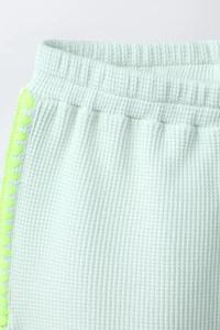 SHORT WAFFLE CONTRASTE FLUO