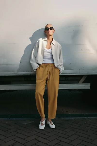 BALLERINES EN CUIR AVEC SURPIQÛRES
