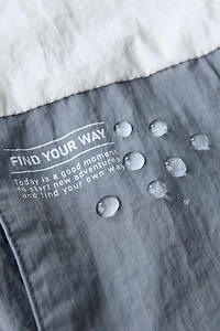 LIGHTWEIGHT HOODED RAINCOAT