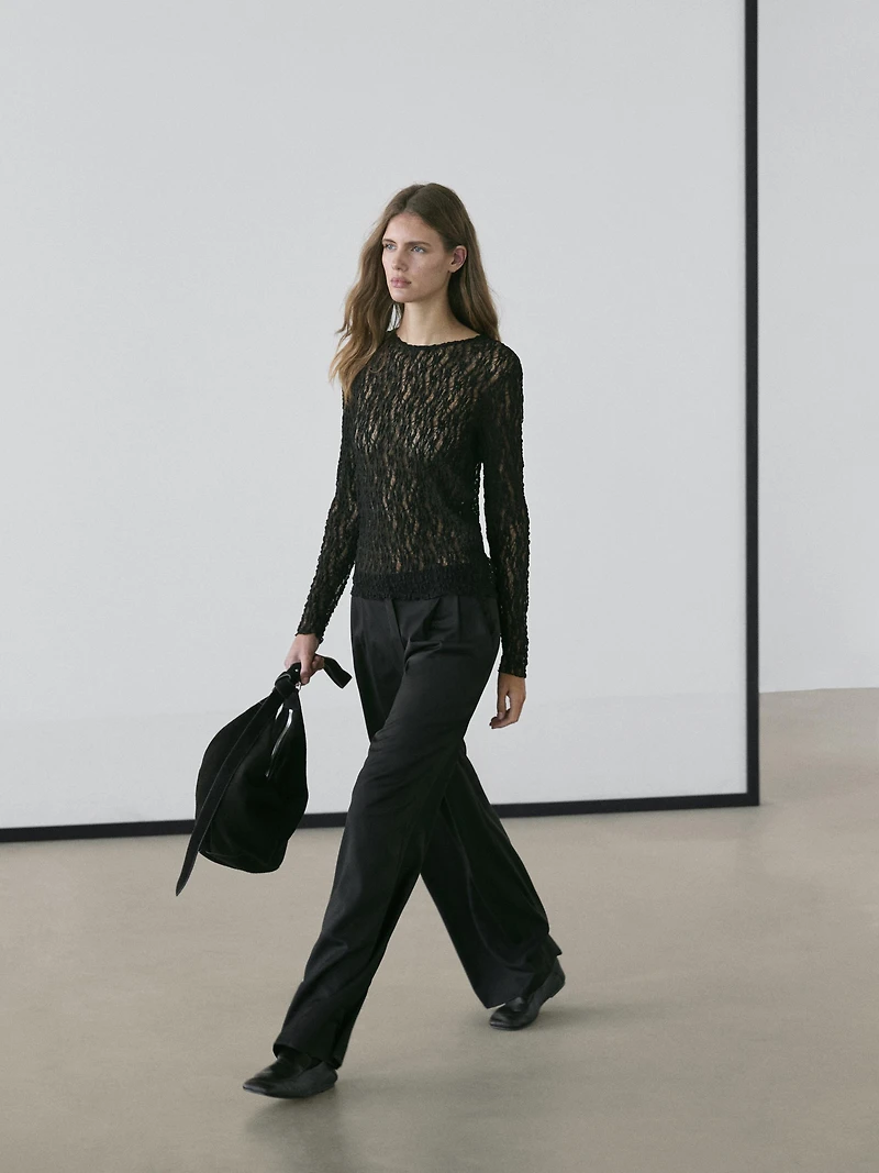 Top en maille de dentelle ajourée à manches longues