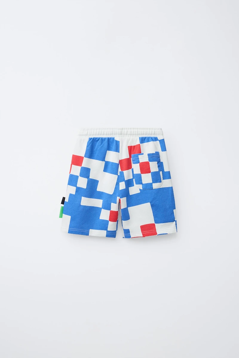 SHORT À CARREAUX AVEC ÉTIQUETTE LOGO