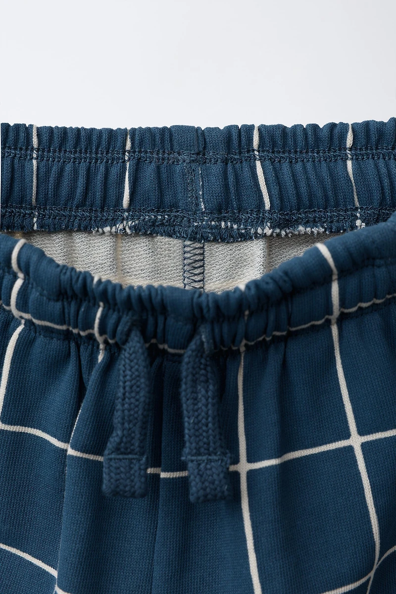 SHORT IMPRIMÉ À CARREAUX