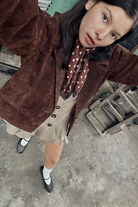 GILET EN MAILLE FINITIONS CÔTELÉES