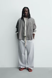 PANTALON BAGGY À RAYURES
