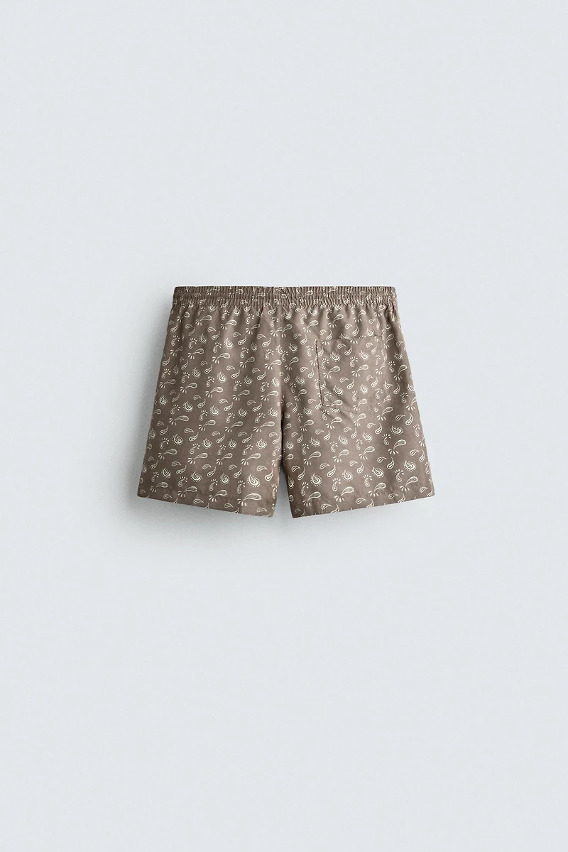 PAISLEY PRINT MID-LENGTH SWIM TRUNKS