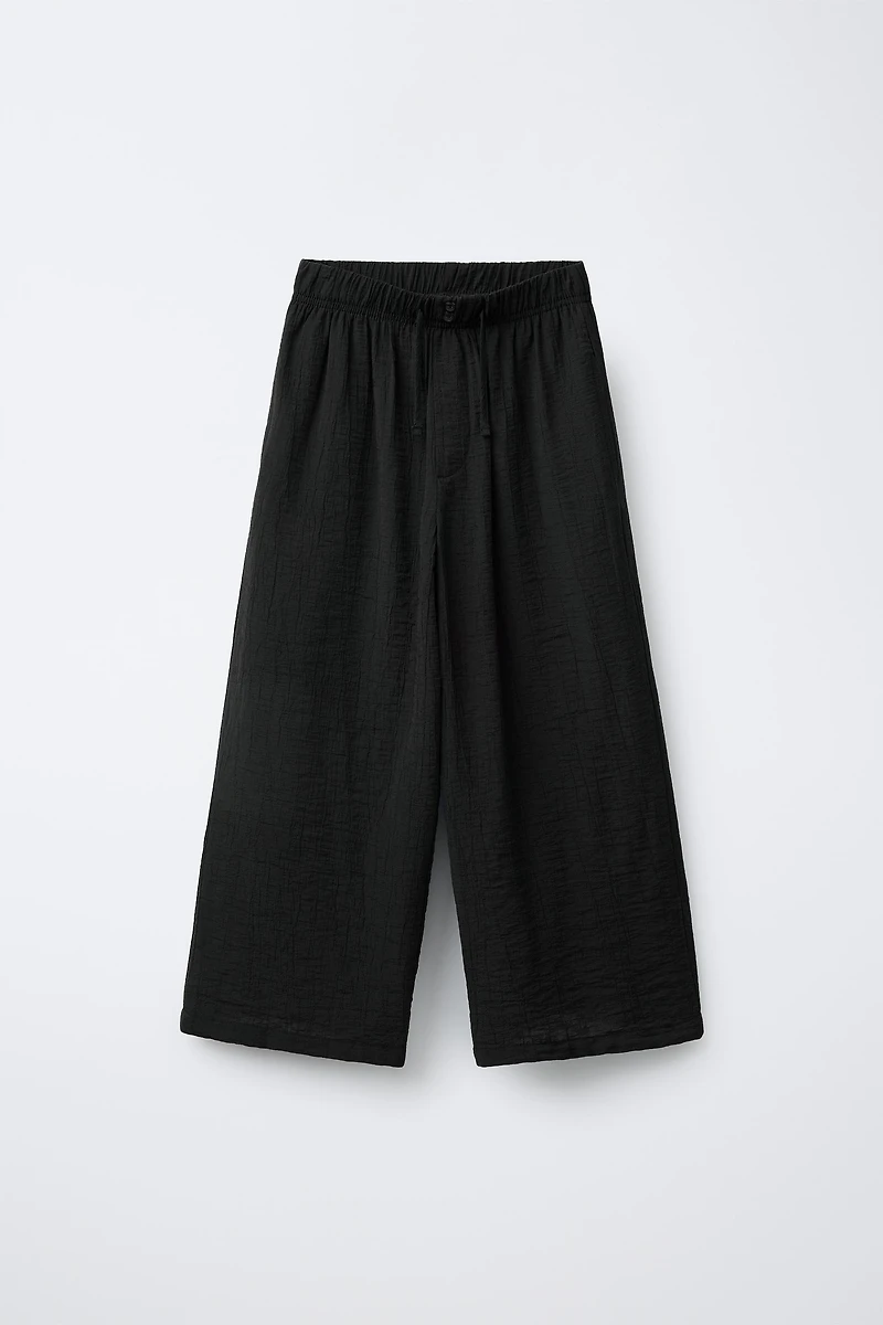 WRINKLED EFFECT WIDE LEG PANTS