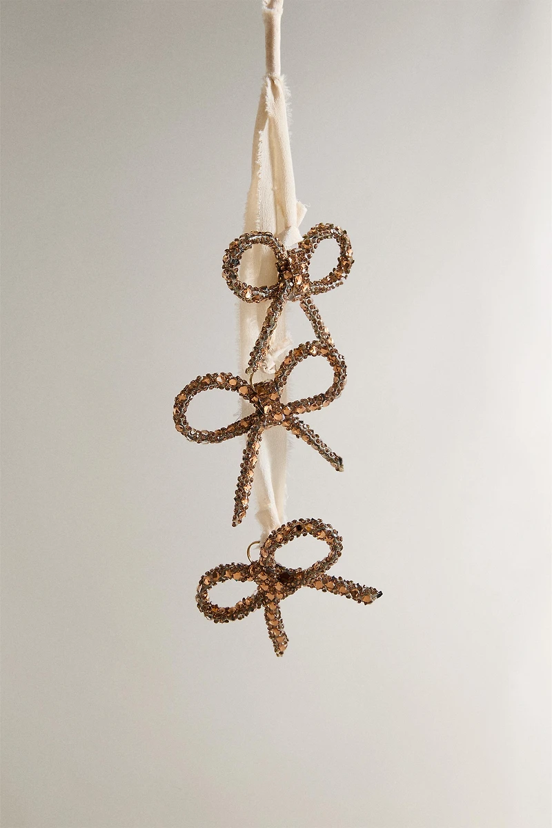 GLITTERY BOW CASCADE CHRISTMAS ORNAMENT