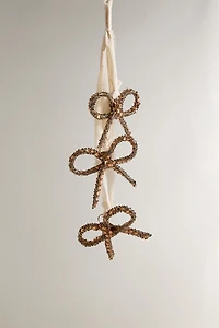 GLITTERY BOW CASCADE CHRISTMAS ORNAMENT