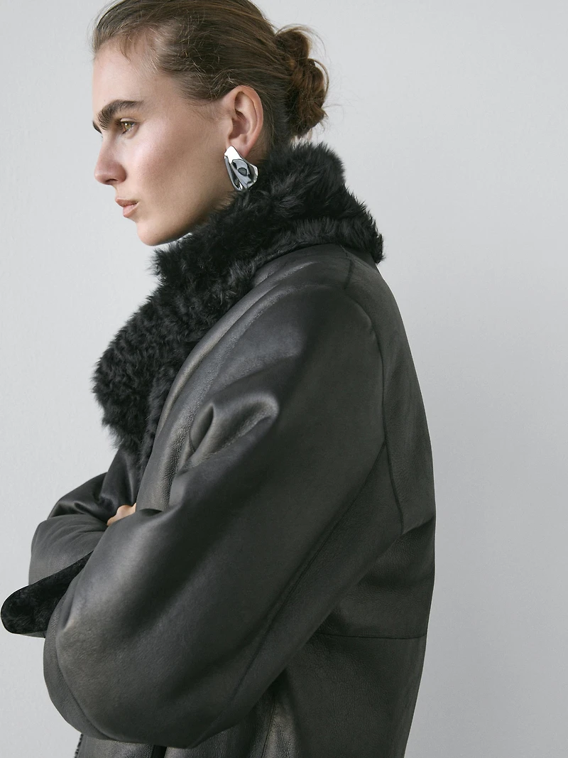 Sheepskin leather coat with lapel collar