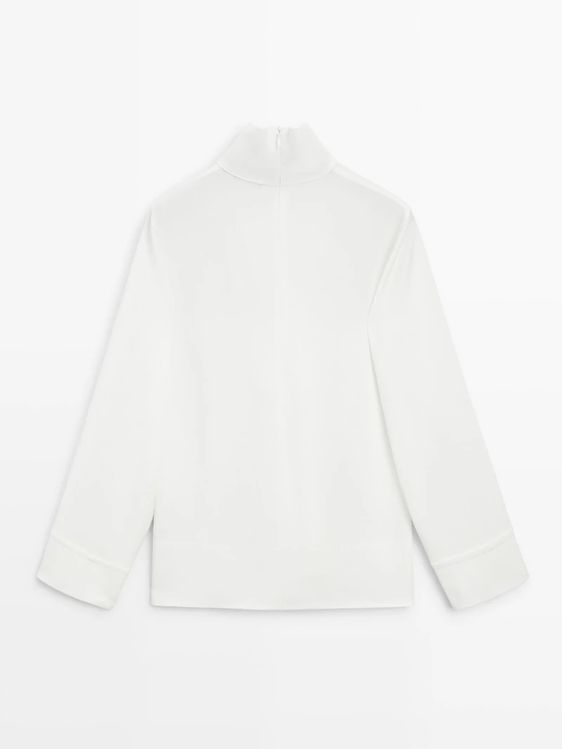 High neck blouse with hem detail