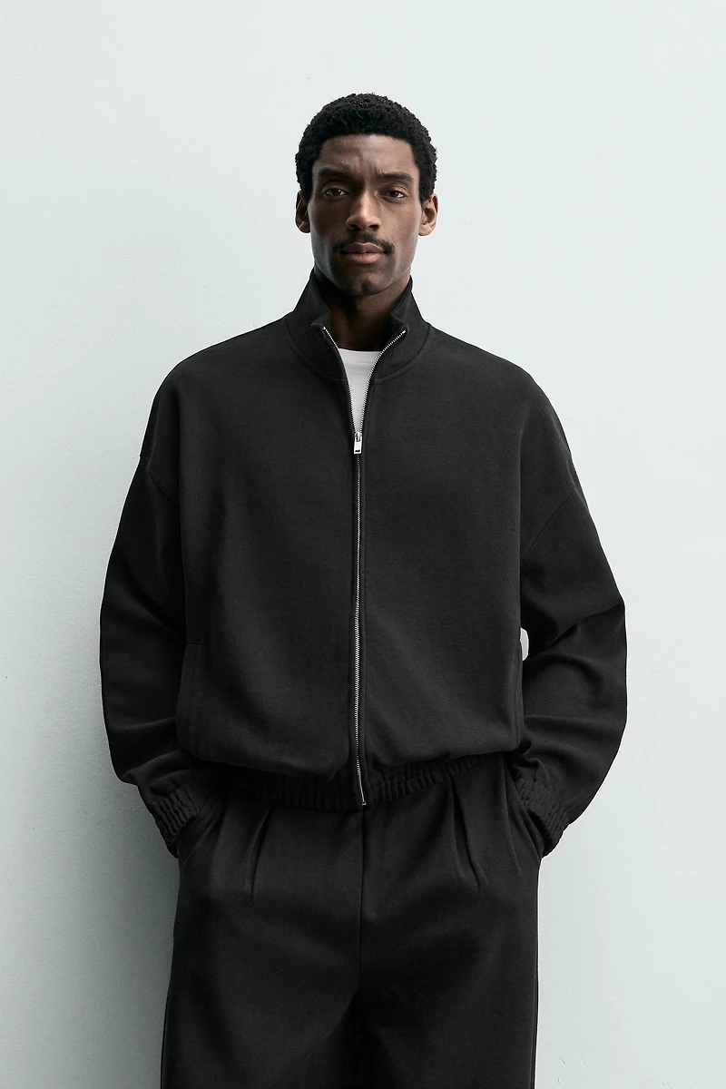 INTERLOCK ZIP SWEATSHIRT