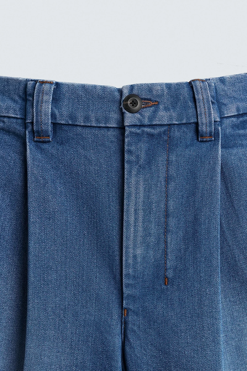 RELAXED FIT PLEATED DENIM SHORTS