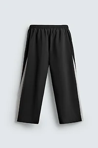 TECHNICAL PANTS WITH STRIPES