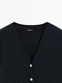 Knit vest with golden buttons